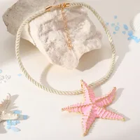 collier ras de cou étoile de mer rose